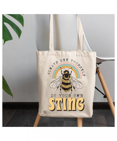 Always Bee Yourself, Do Your Own Sting Pun Quote with Rainbow & Honey Bee Art Merch Gift, 12oz Canvas Tote Bag $13.50 Totes